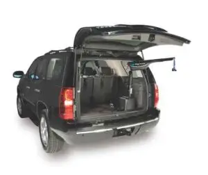 Image of black SUV with a Harmar AL425HD wheelchair lift installed in the rear hatch