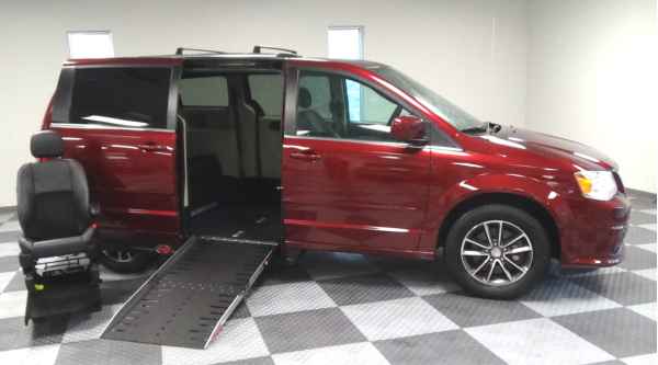 Image of a red Dodge Caravan wheelchair van from Adaptive Vans