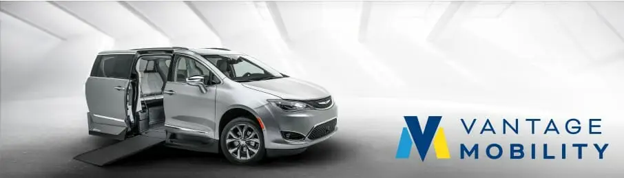 Banner image showing a silver Chrysler Pacifica wheelchair van on a geometric background with a Vantage Mobility logo in the right corner