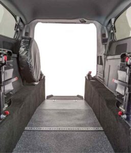 Image from inside a rear-entry wheelchair van looking out the rear of the vehicle showing the conversion features
