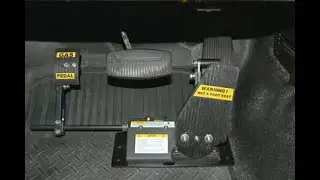 close up photo of a left foot accelerator inside a car
