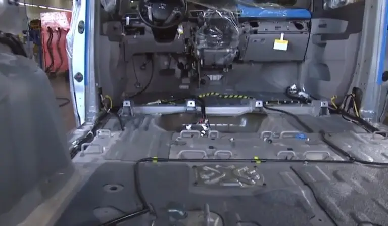 Inside a minivan after everything has been removed right before the wheelchair van conversion process starts
