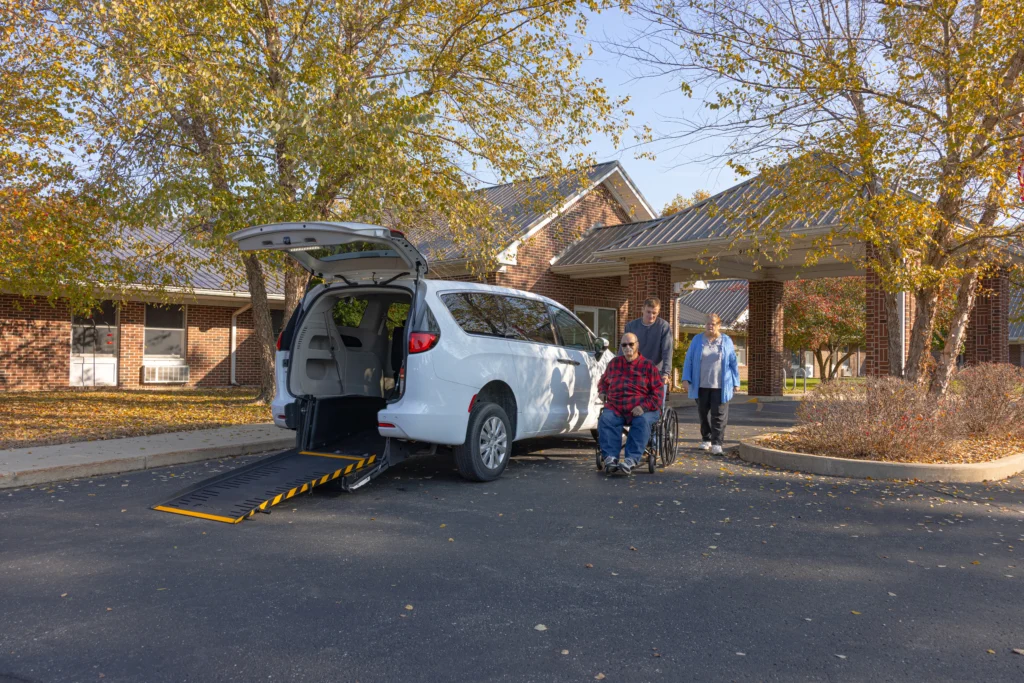 family next to a rear entry van conversion