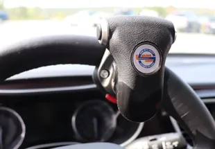 ez spin hand control attached to steering wheel